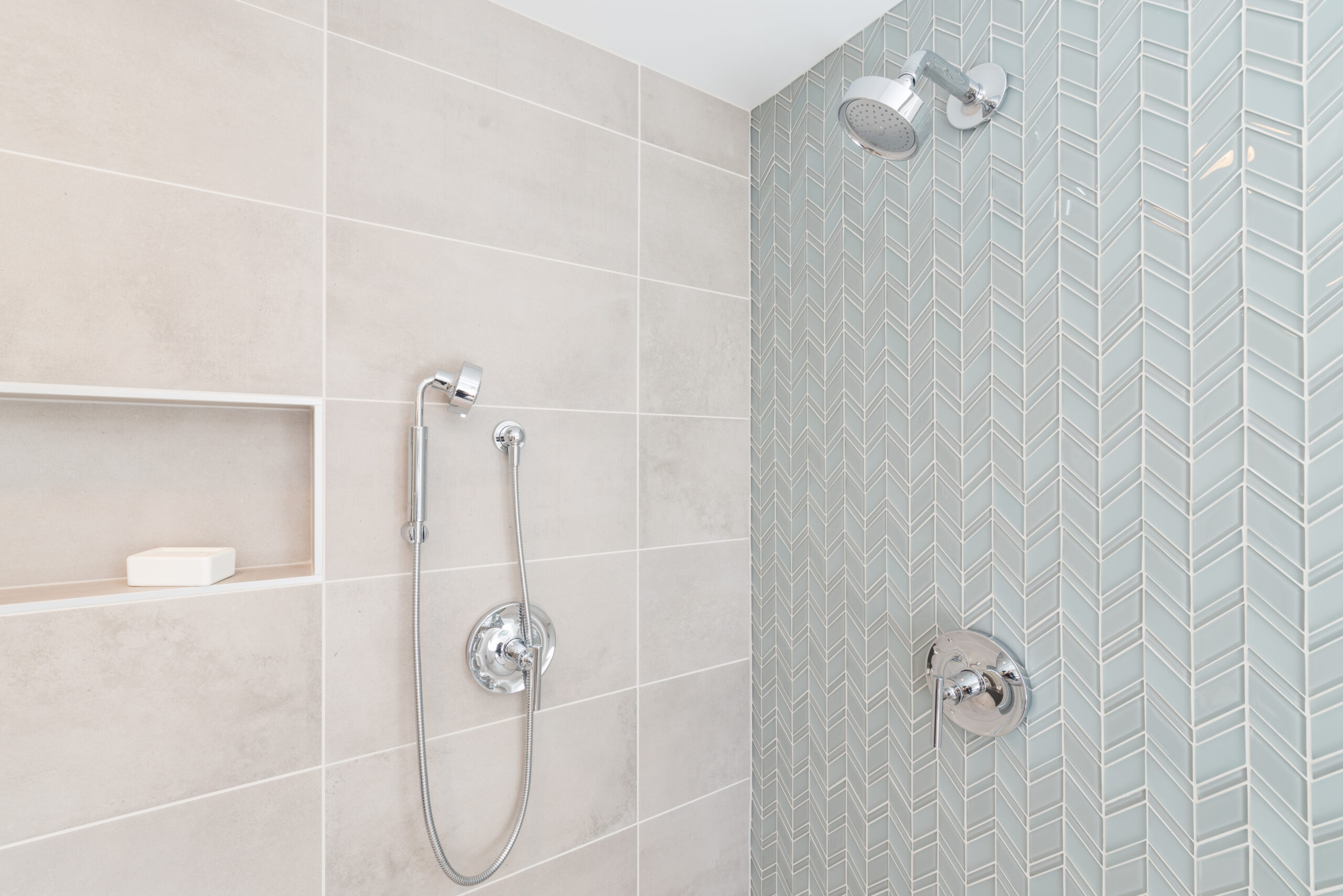 Fresh luxury shower with green glass tile wall